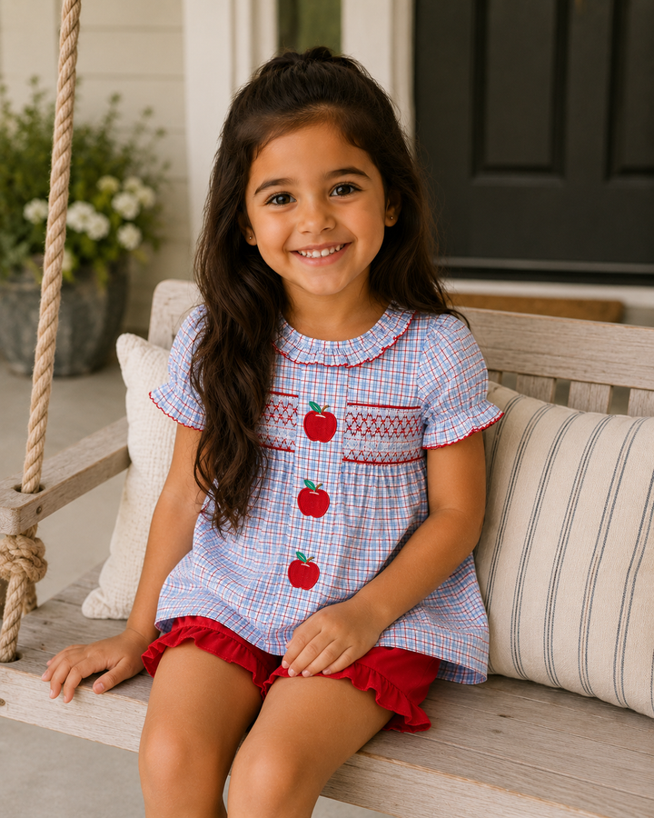 Young girl sitting on a porch swing
