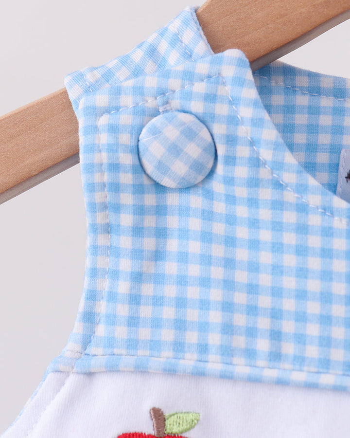 Light blue gingham smocked yoke bubble romper with round neckline detail and apple applique