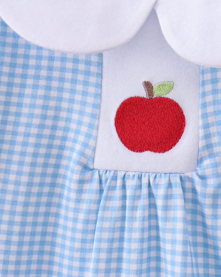 Red apple patch on light blue gingham dress with white Peter Pan collar