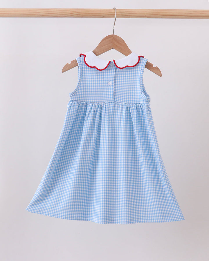Blue Apple smocked dress with red ruffle collar and flared skirt