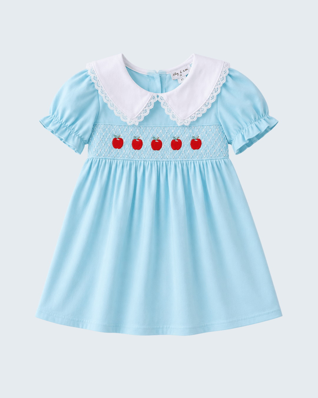 Light blue smocked lace dress with red apple row on smocked bodice