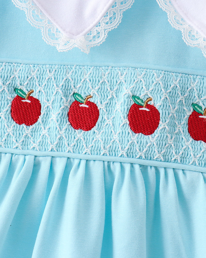 Light blue smocked lace dress with red apple embroidery and gathered skirt