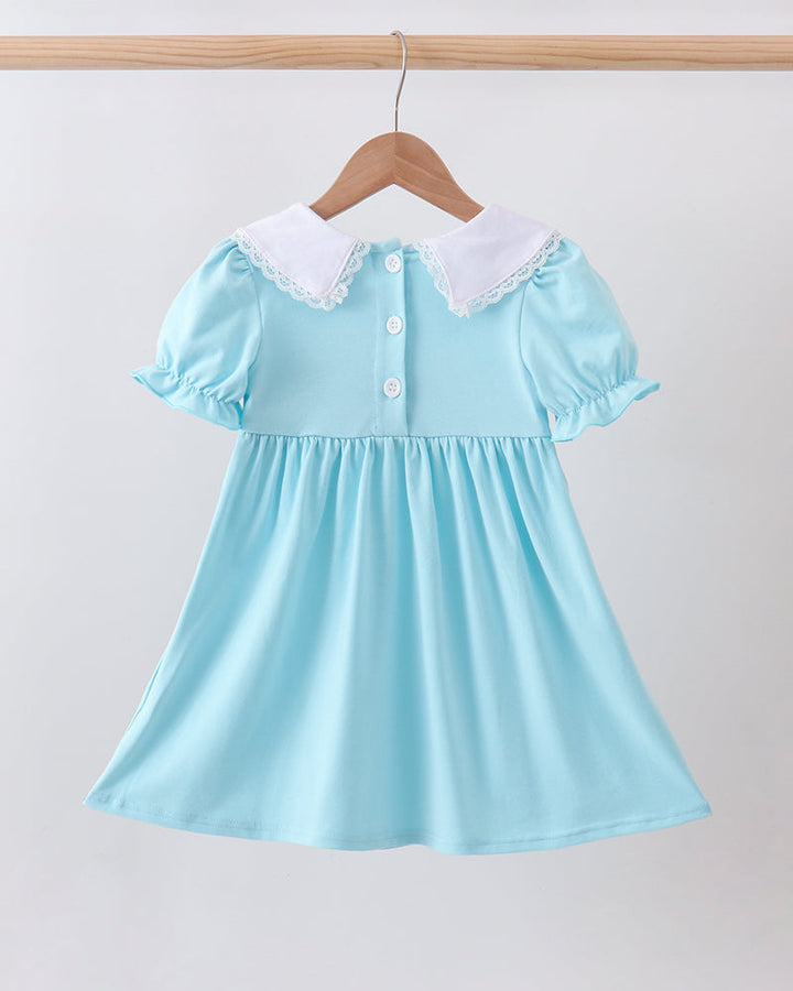 Light blue smocked lace dress with white lace collar and short flutter sleeves
