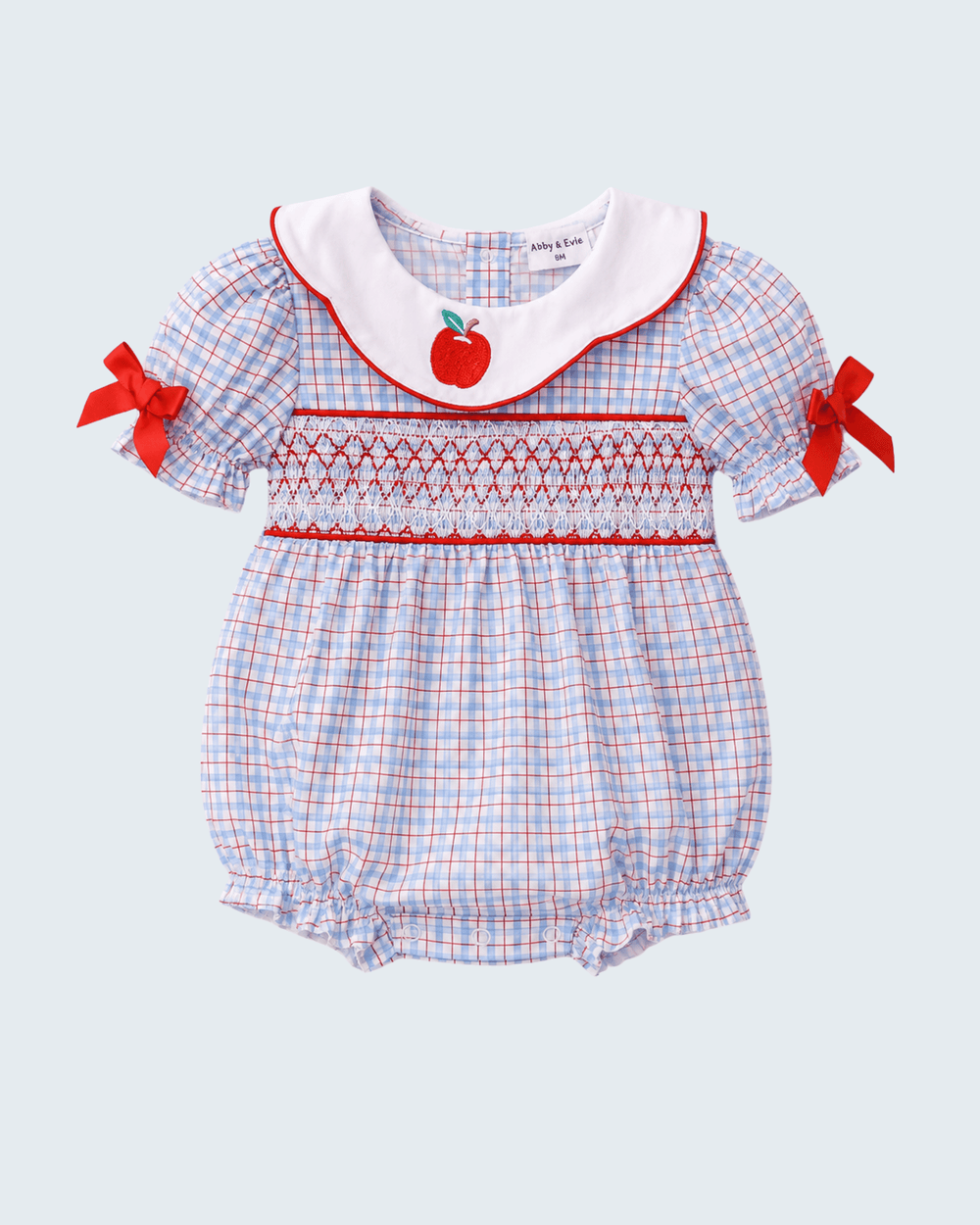 Blue Apple Smocked Plaid Bubble on light grey background