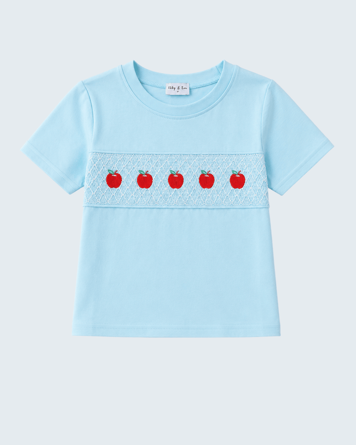 Light blue short-sleeve top with embroidered apple border