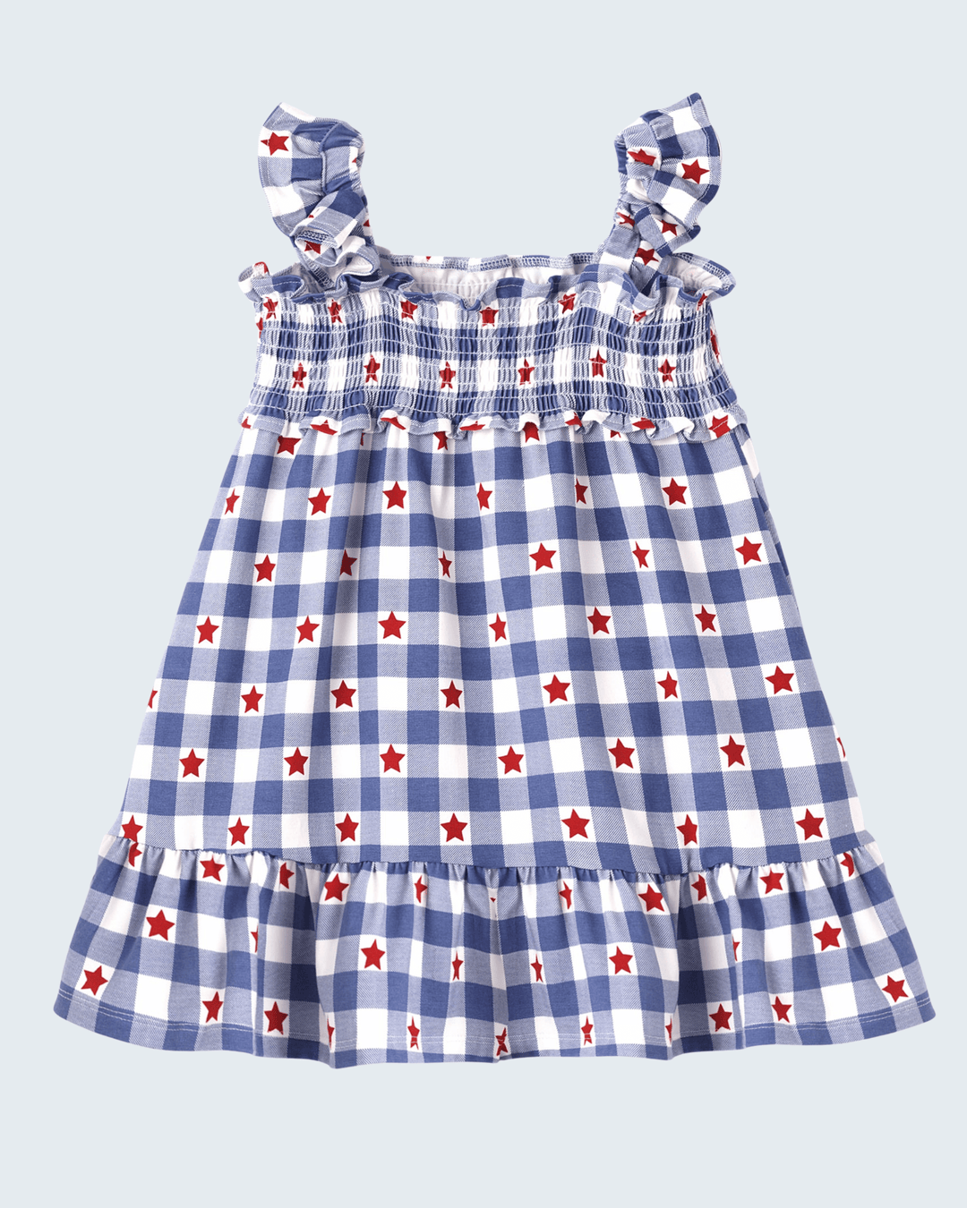 Children's dress with blue and white check pattern and red stars on a light gray background