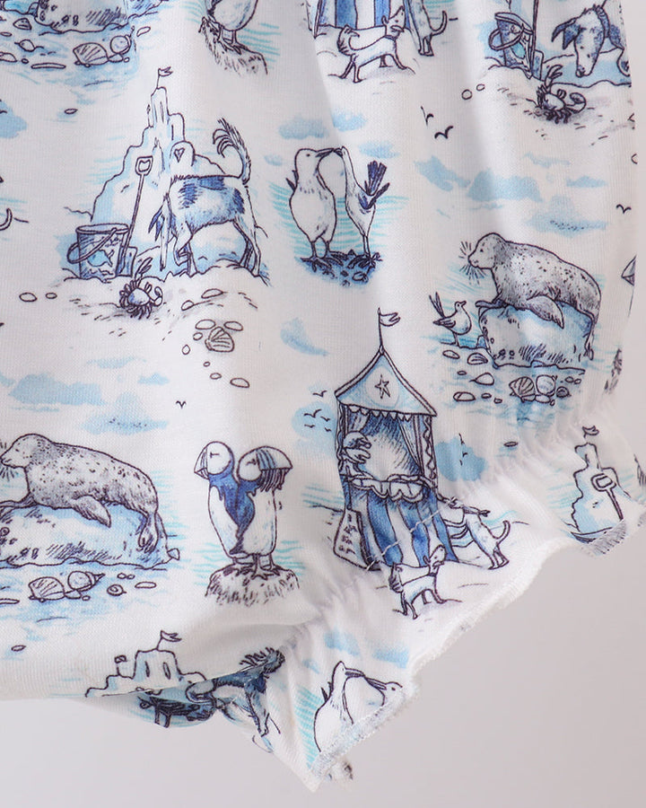Fabric with blue and white animal print on a white background