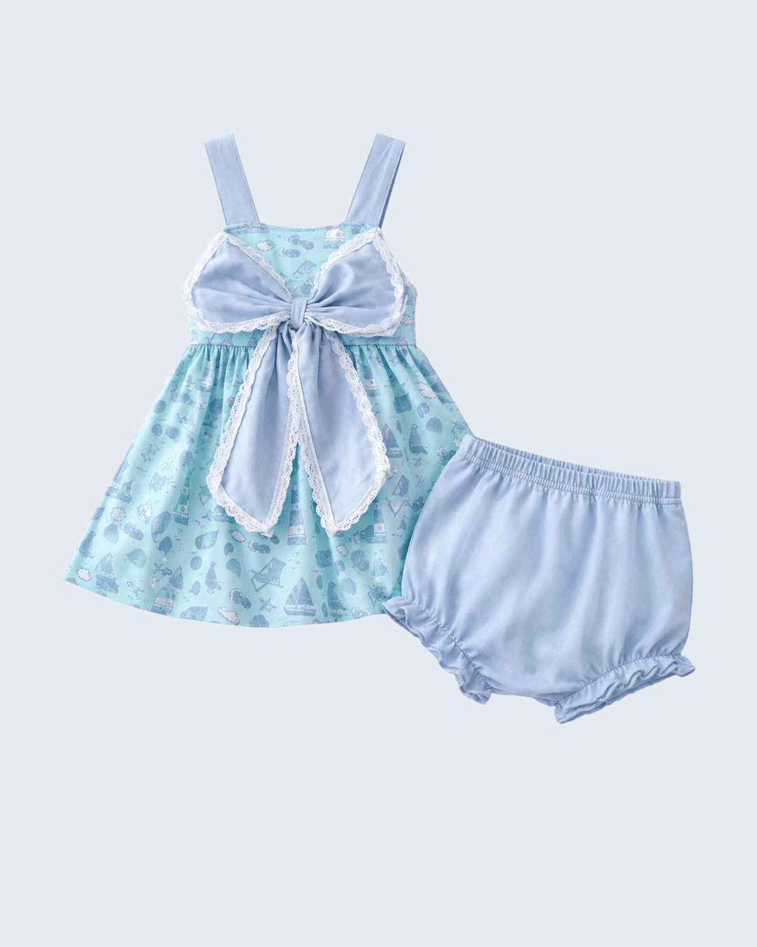 Children's blue dress with bow and matching bloomers on a light gray background