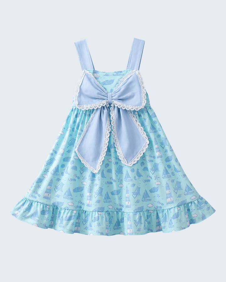Light blue dress with a large bow on a white background