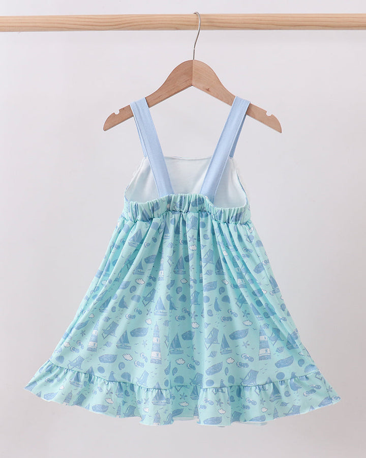 Sleeveless marine inspired girls dress on hanger