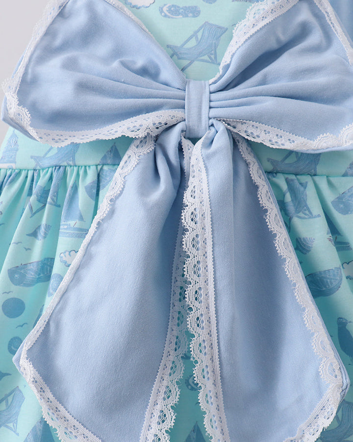 Large blue bow on marine print fabric