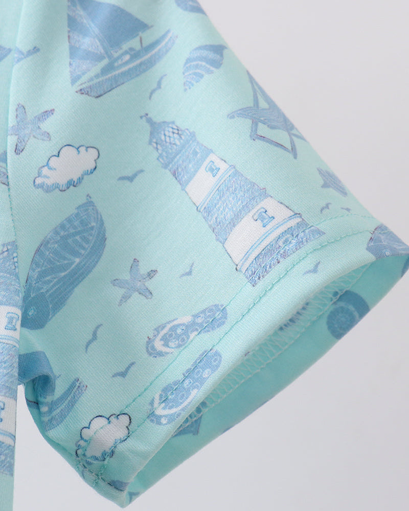 Light blue fabric with nautical patterns including lighthouses, ships, and stars on a white background.