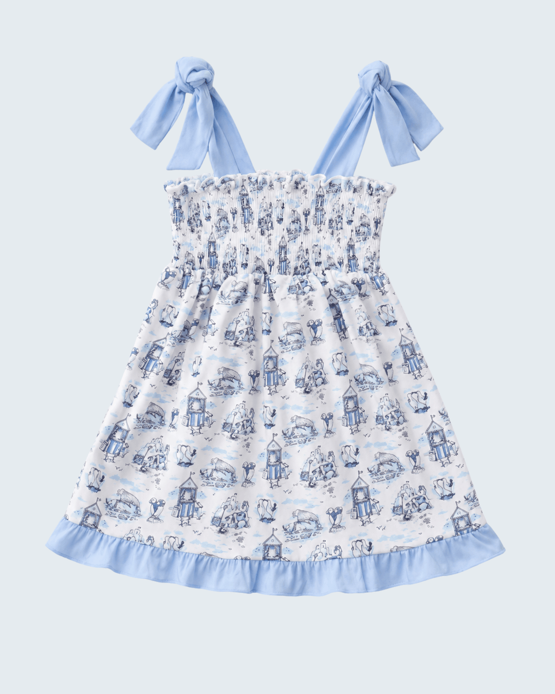 Children's dress with blue and white pattern on a light blue background