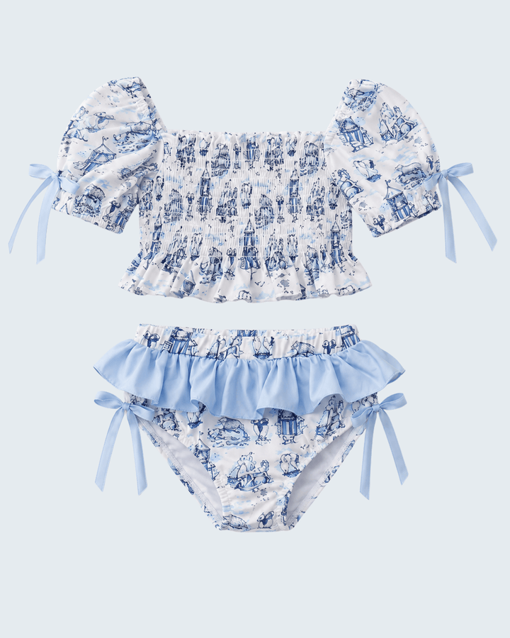 Two-piece swimsuit with ruffled top and bottom on a light blue background