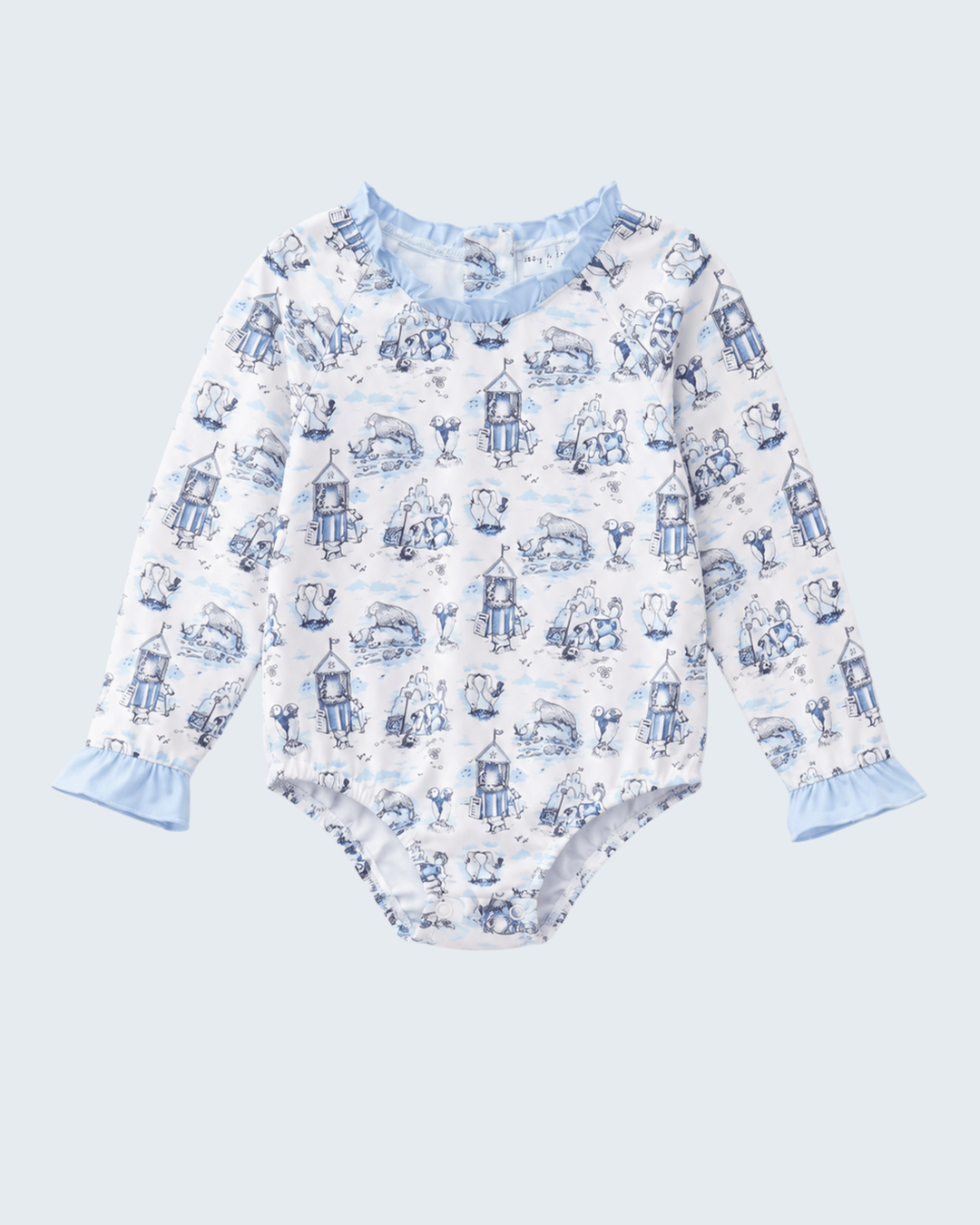Children's swimsuit with blue and white pattern on a light blue background