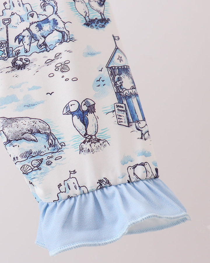 One-piece swimsuit with a nautical-themed print on a plain background