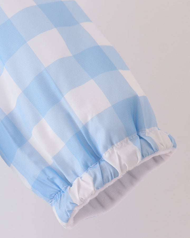 Light blue and white gingham raincoat sleeve with elastic cuff