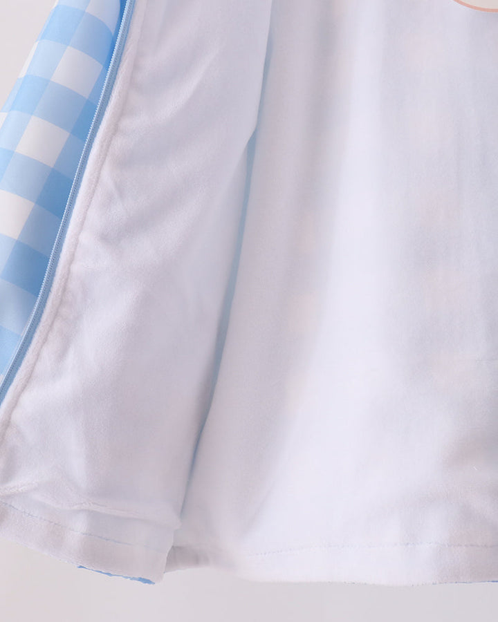 Light blue gingham raincoat hem with wide white base panel