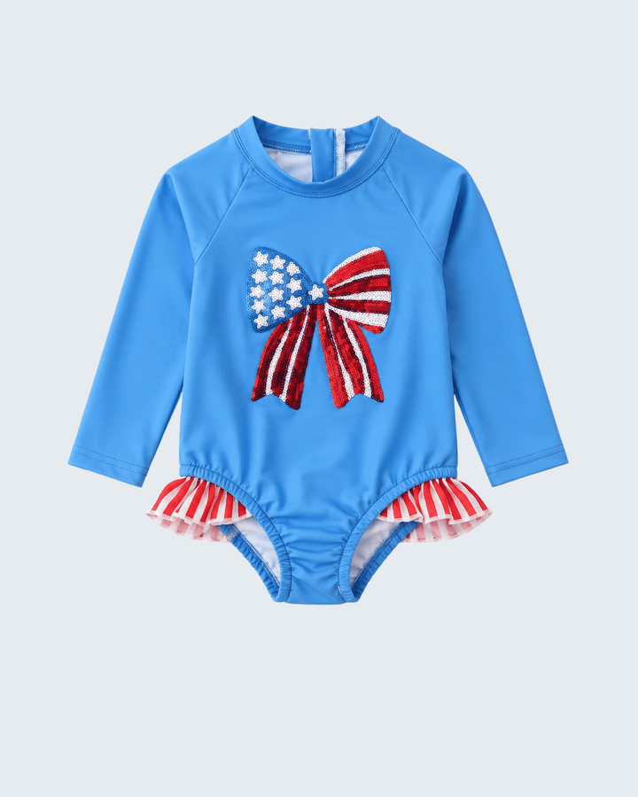 Blue swimsuit with American flag design on a light gray background