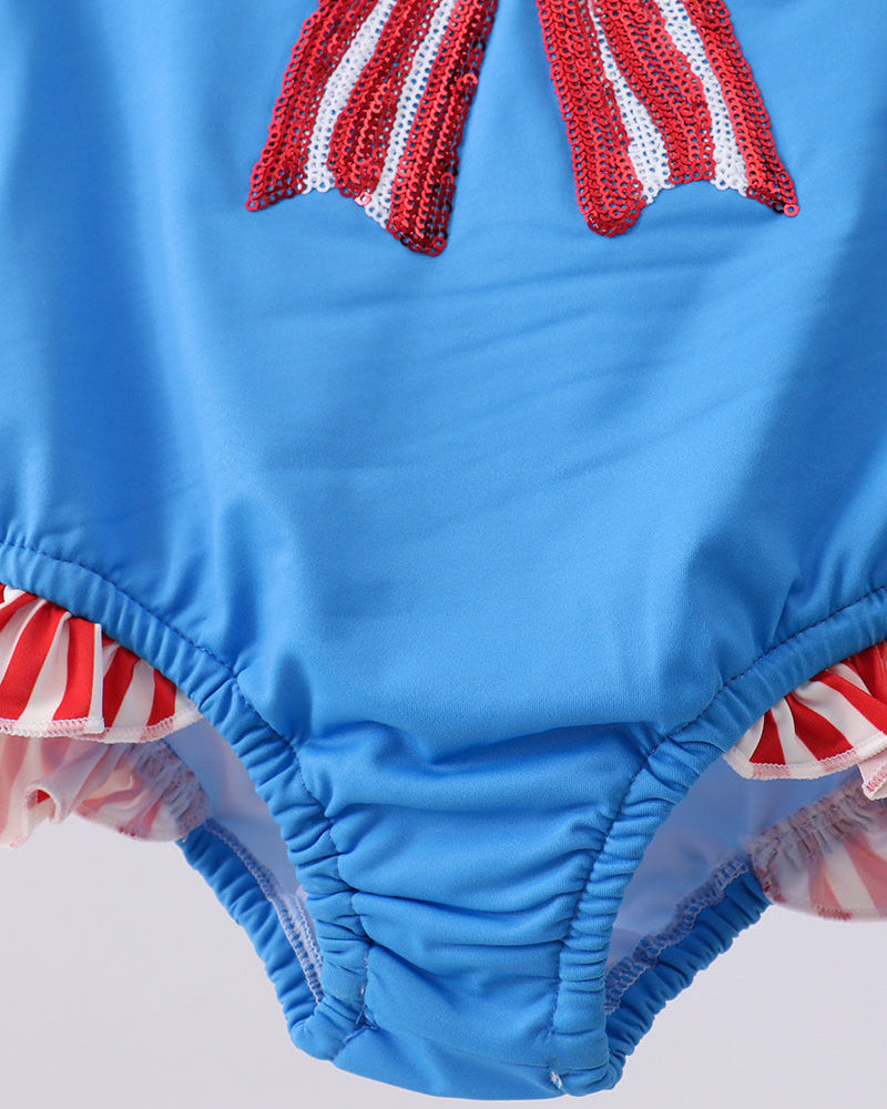 Bottom of swimsuit with ruffles at leg opening