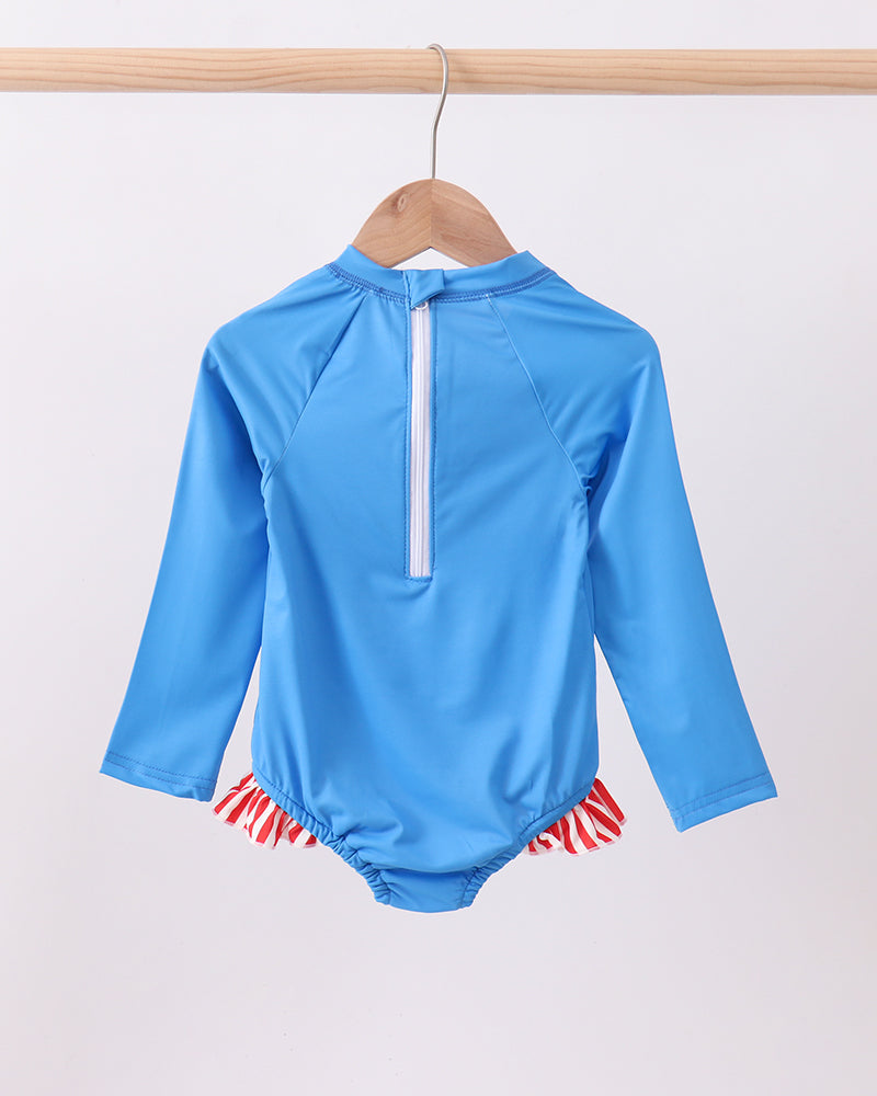 Blue Bow Sequin Rashguard on hanger