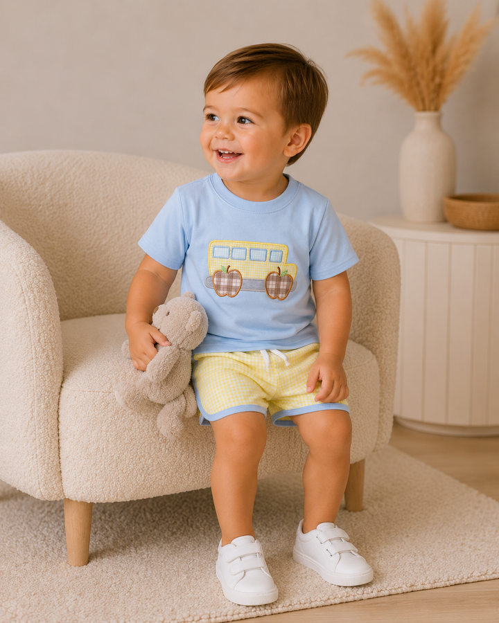 Kids light blue bus applique T-shirt with yellow gingham bow shorts set, worn