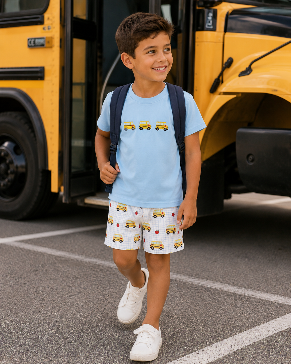 Kids bus T-shirt and shorts set worn by child, light blue tee with bus graphic