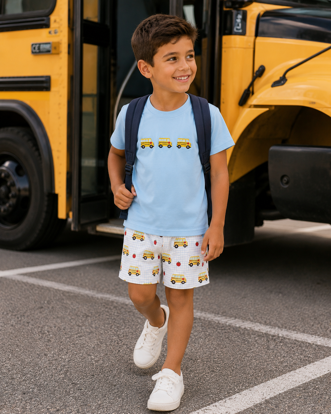 Kids bus T-shirt and shorts set worn by child, light blue tee with bus graphic