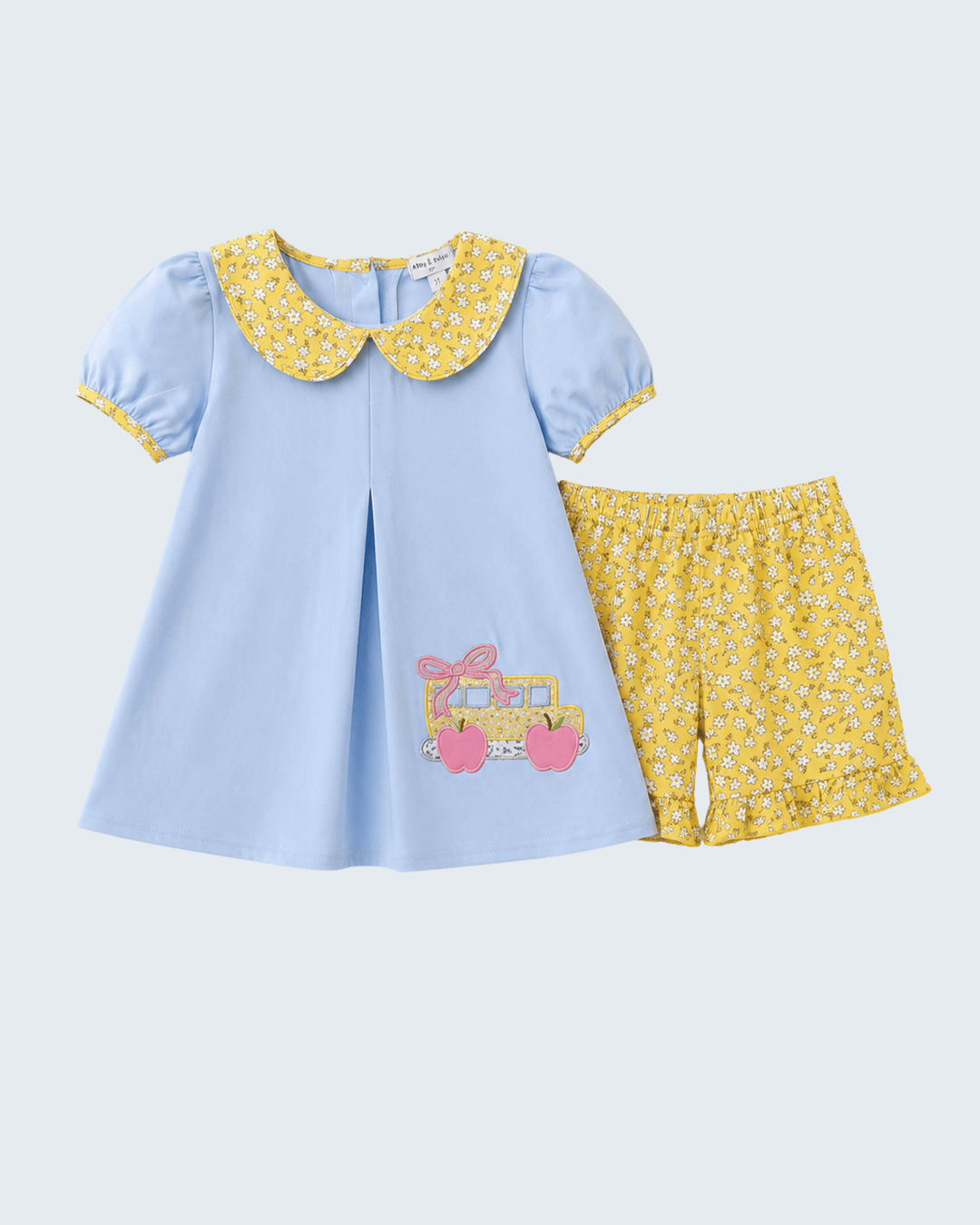 Light blue dress with floral-collar applique and yellow patterned ruffle shorts set