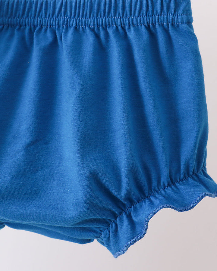 Blue baby bloomers on a white background