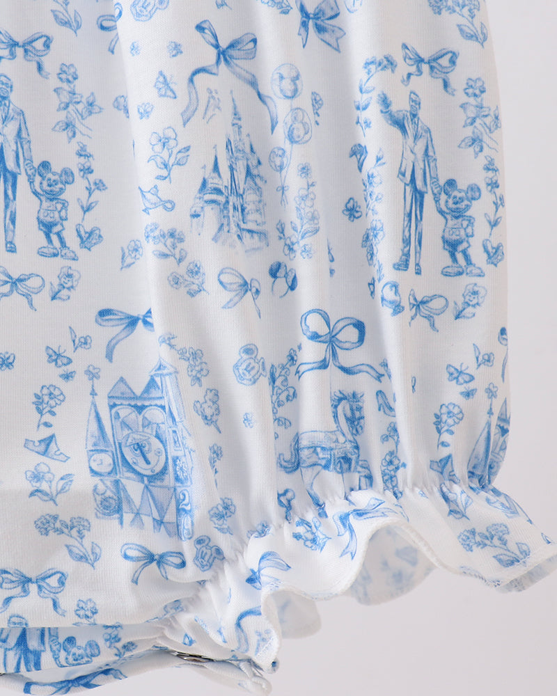 White fabric with blue vintage-style print on a white background