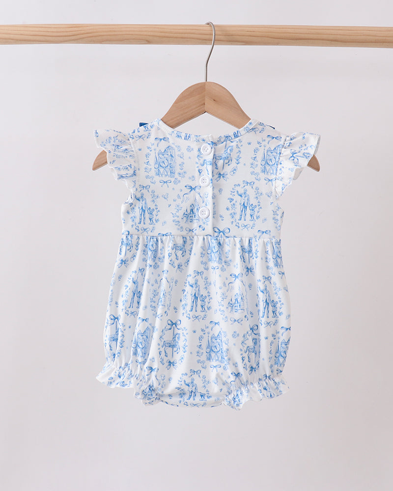 Floral-patterned baby romper on a hanger against a plain background