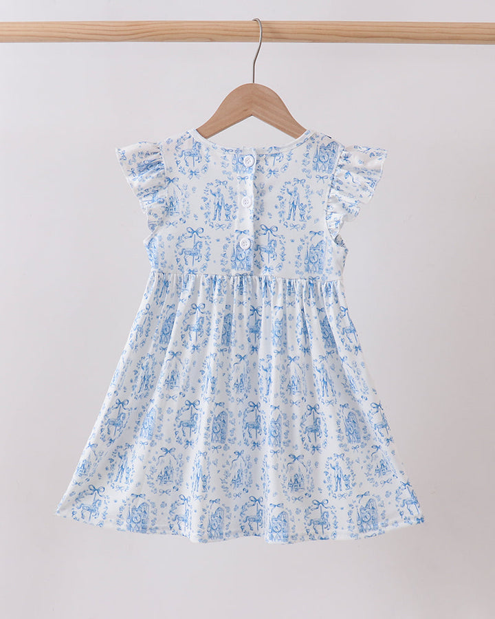 Floral dress hanging on a wooden hanger against a plain background