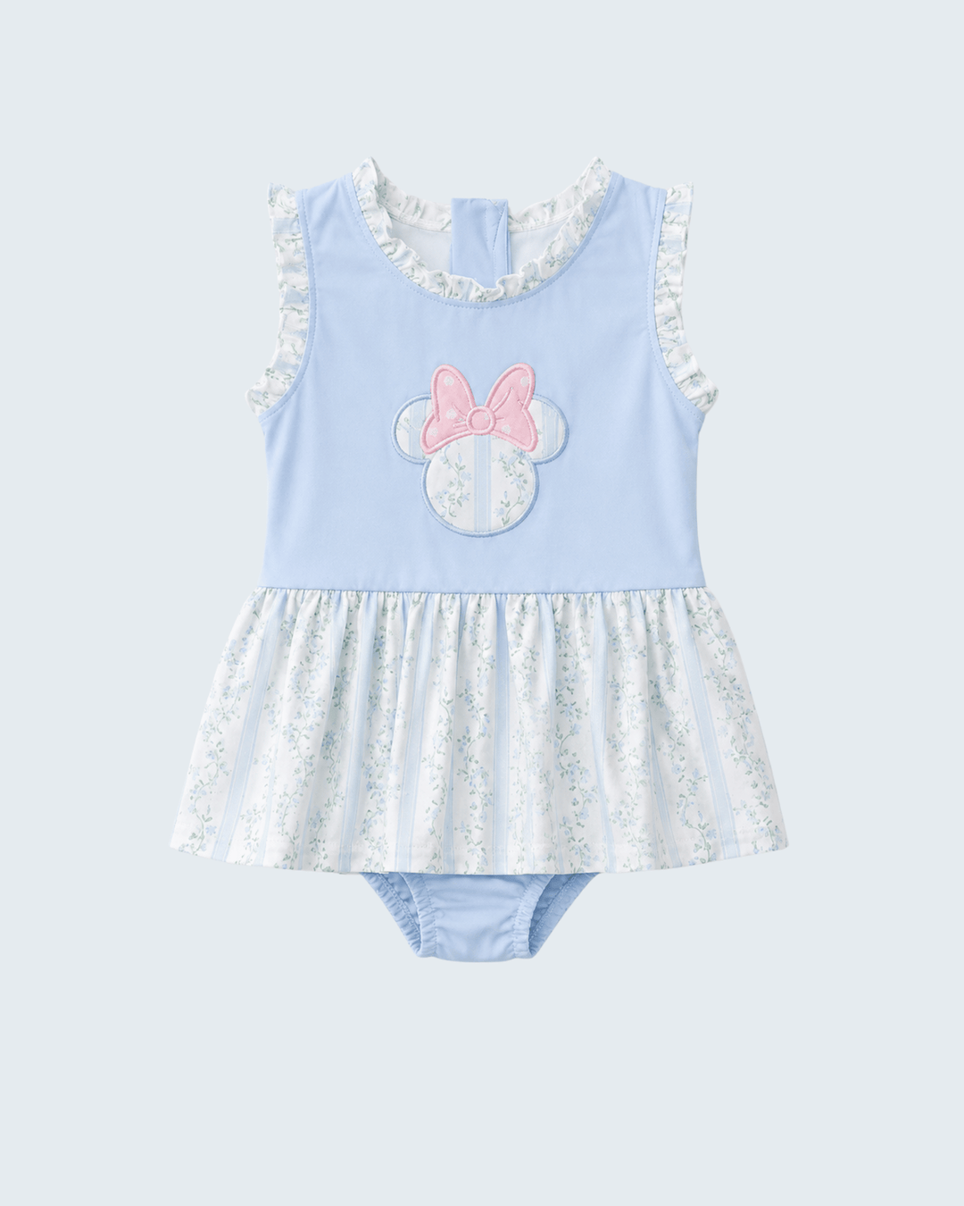 Light blue dress with floral details on a white background