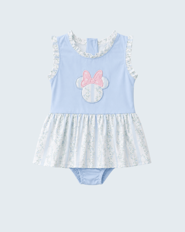 Light blue dress with floral details on a white background