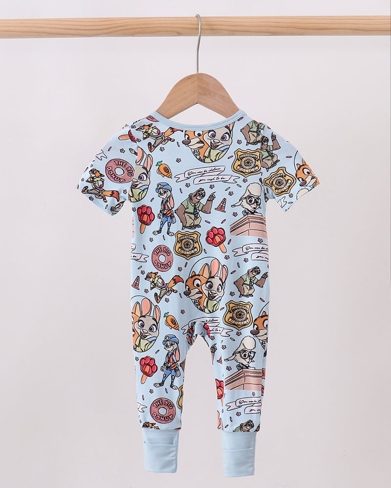Light blue bamboo character romper with full-body playful animal and icon pattern