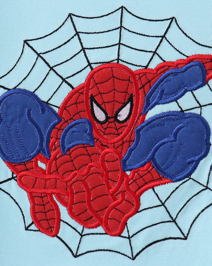 Light blue T-shirt with red and blue character spiderweb embroidery on chest