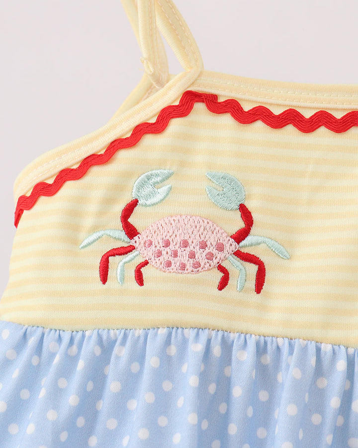 Yellow and blue romper with crab embroidery