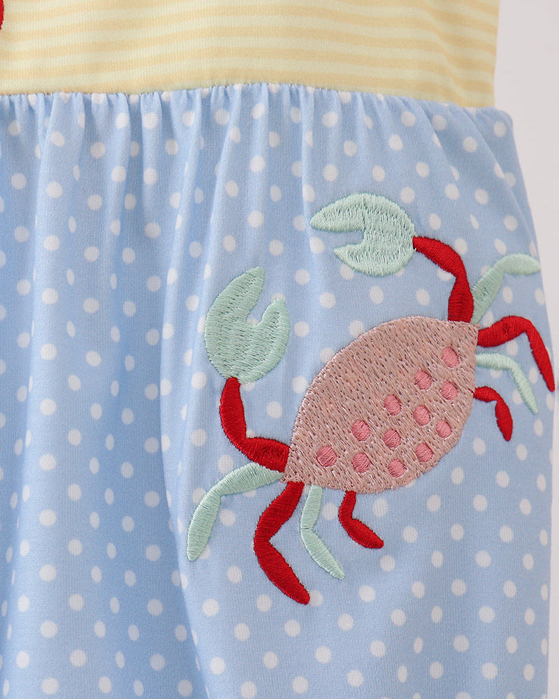 Yellow and blue romper with crab embroidery