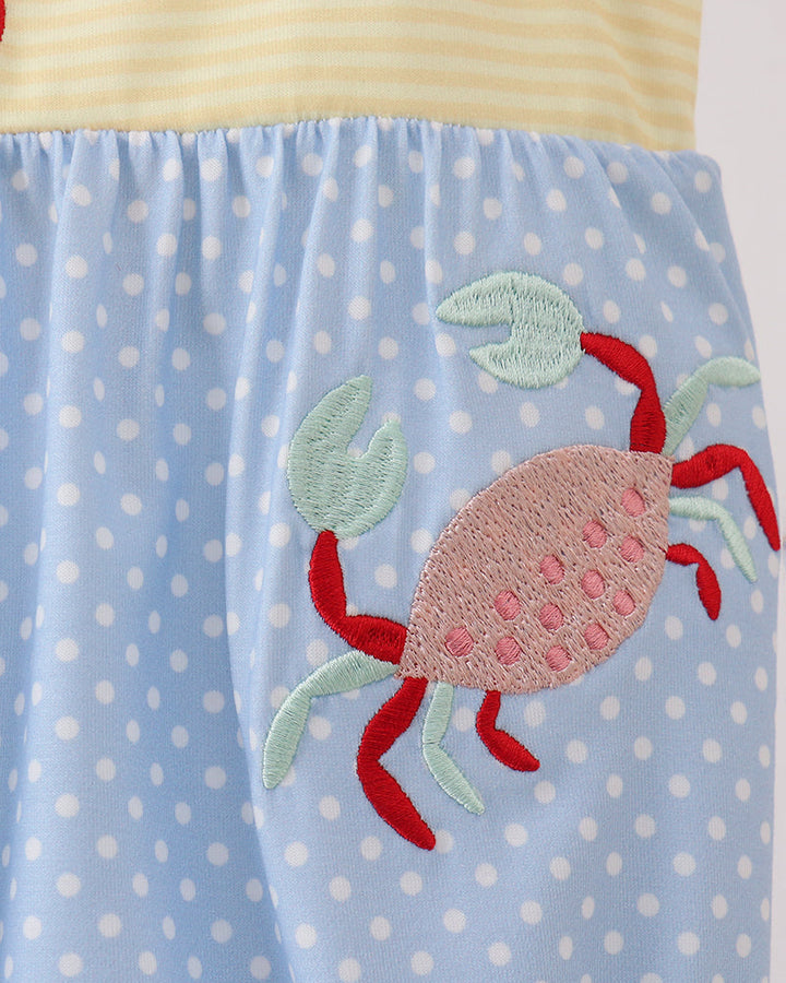 Yellow and blue romper with crab embroidery