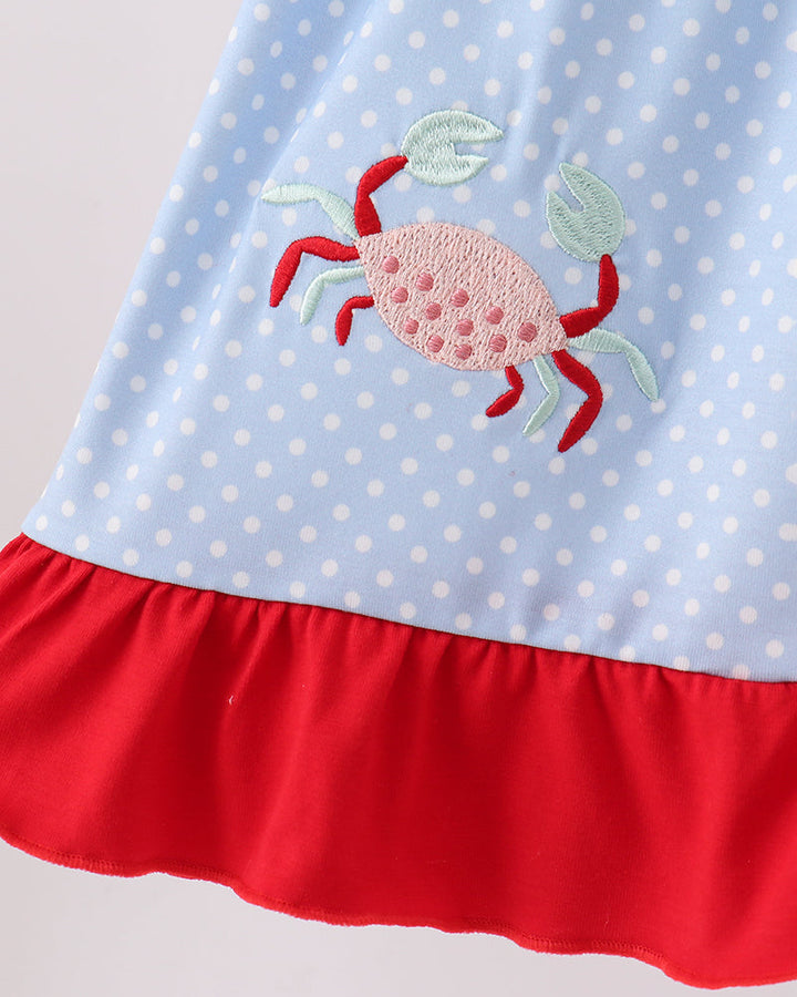 Blue polka dots with a crab embroidery