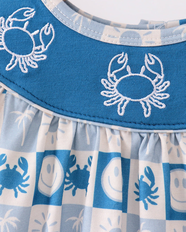 Detail: crab embroidery on blue yoke with blue-and-white checkered bubble romper