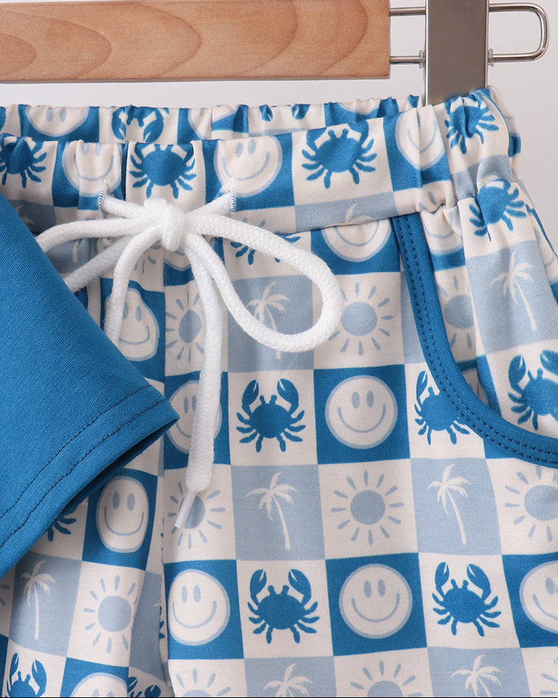 Checkered shorts with blue drawstring waist and sea-life print