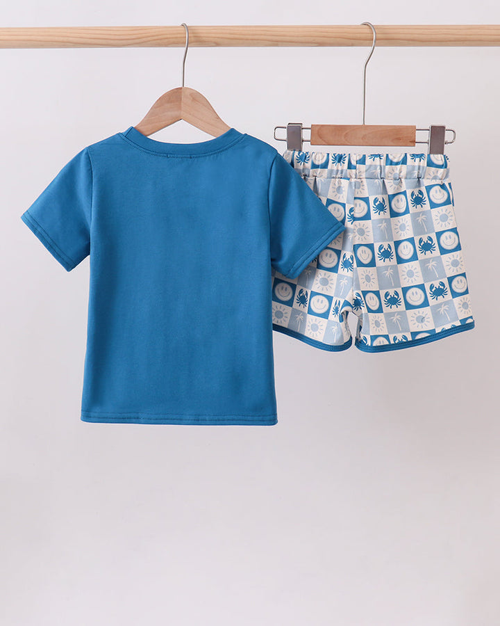 Blue crab embroidered blue T-shirt with checkered shorts set, back view