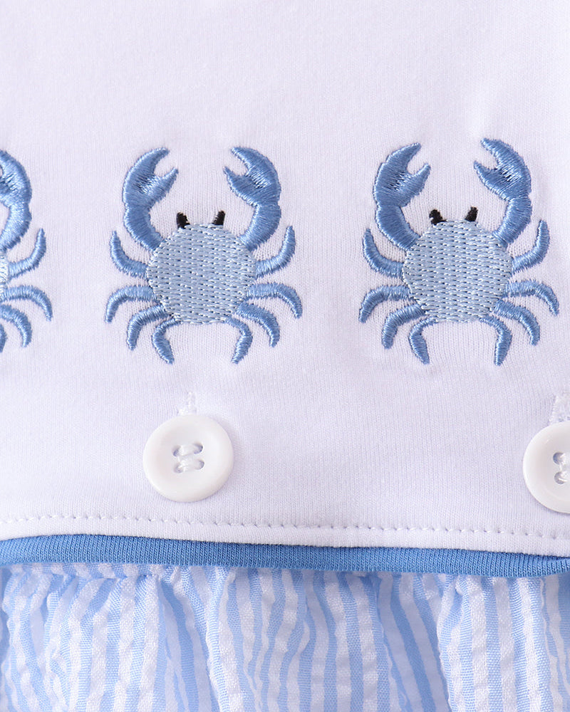 Blue romper with crab embroidery