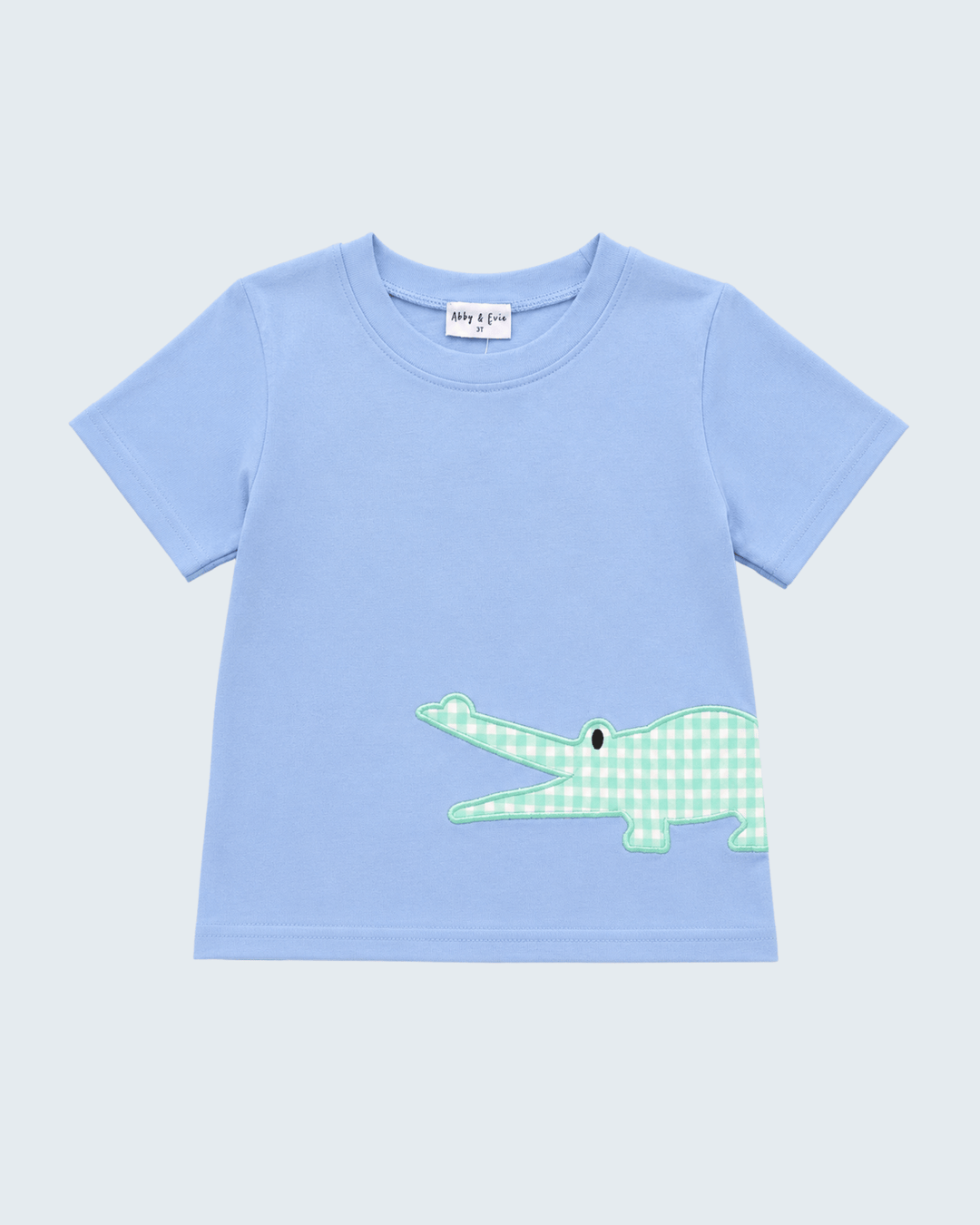 Light blue T-shirt with green plaid crocodile applique graphic