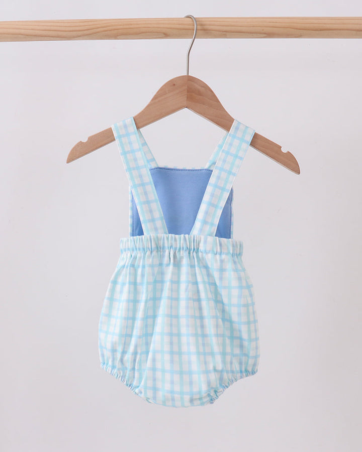 Light blue check bubble romper with blue bib front and adjustable straps