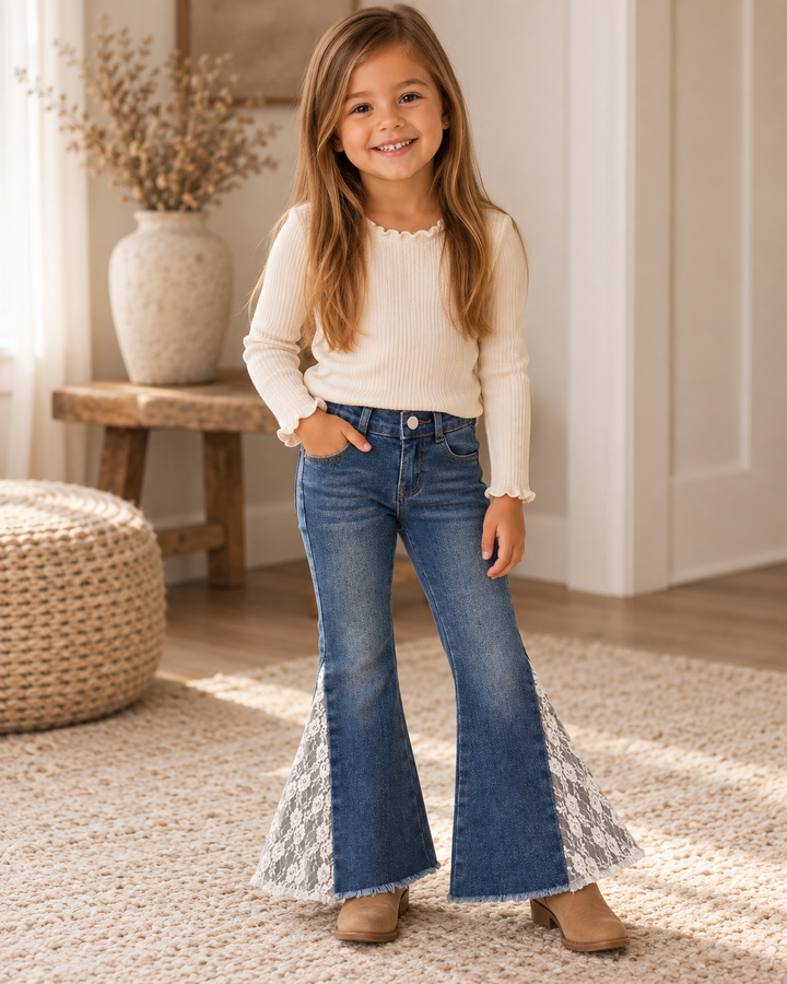 Blue denim bell-bottom jeans with lace panels at the flared cuffs