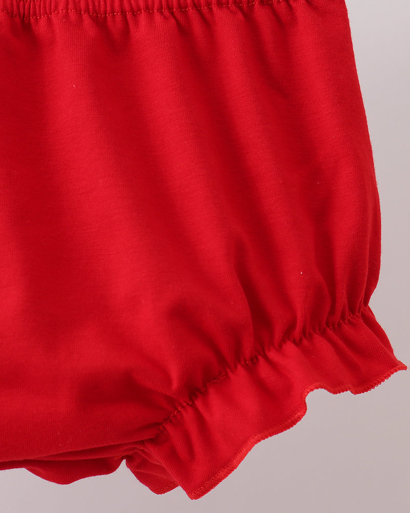 Red bloomer shorts with gathered elastic waist and scalloped hem