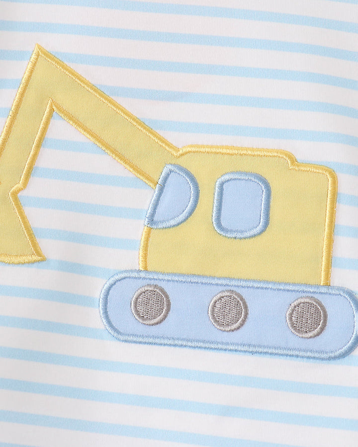 Striped top with yellow and blue excavator appliqué
